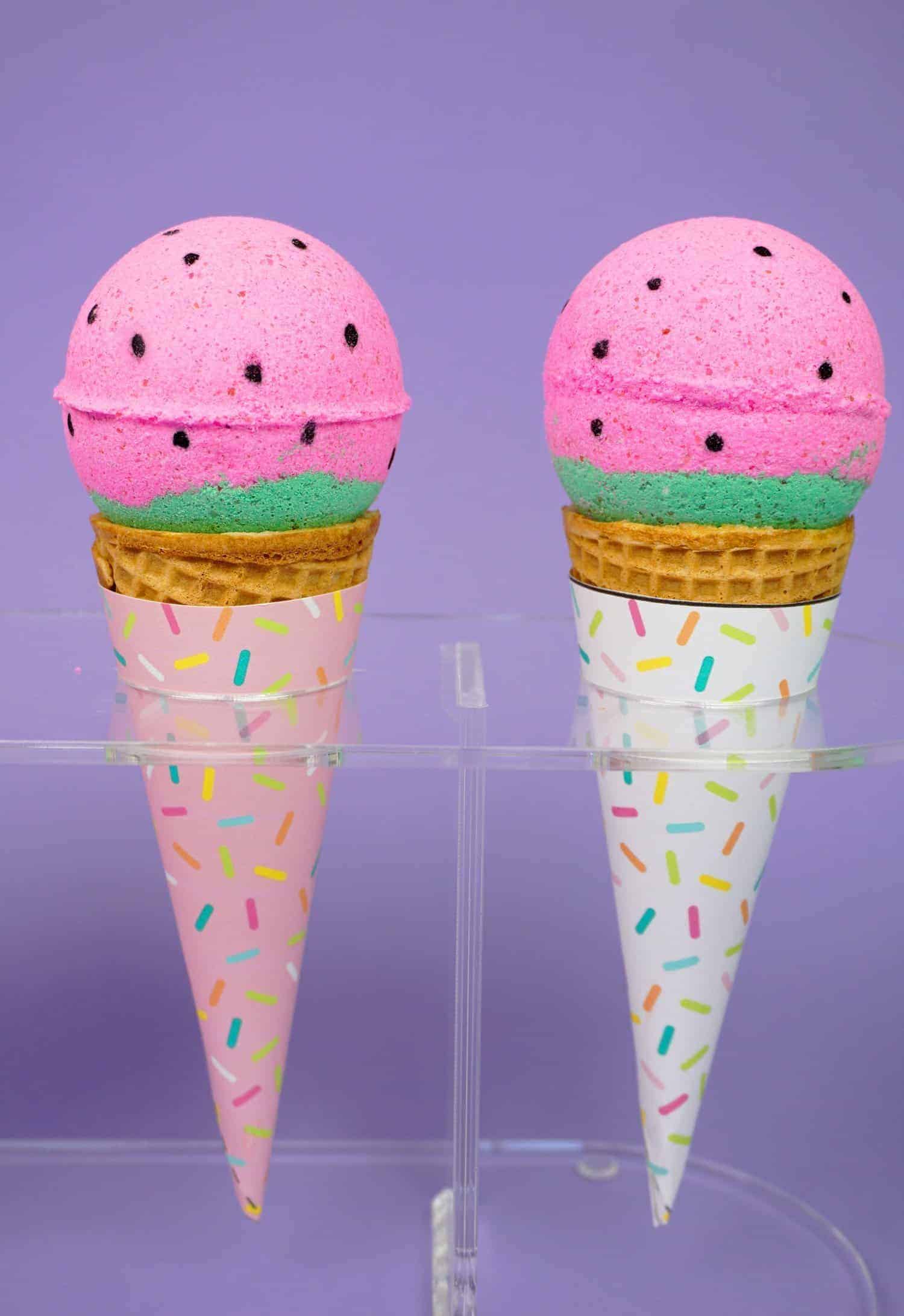 pink bath bombs with black spots in an ice cream cone