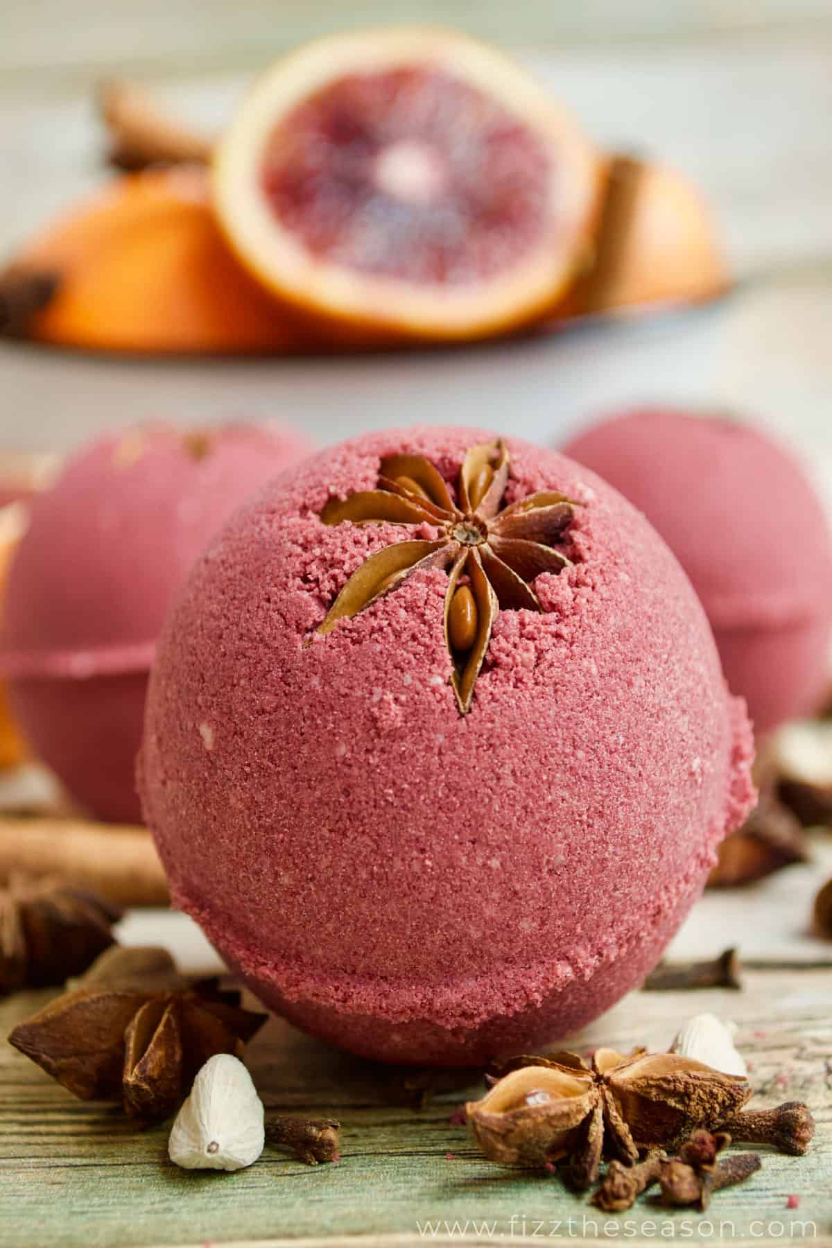 red berry bath bombs with star anise inside