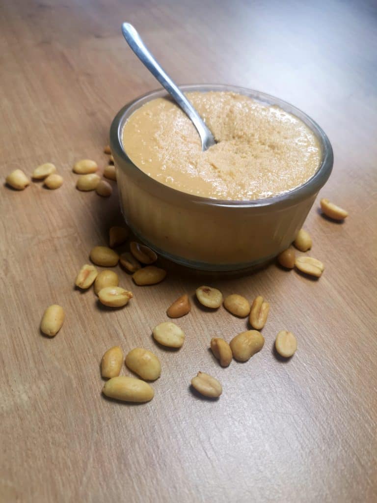 Peanut butter in bowl with spoon