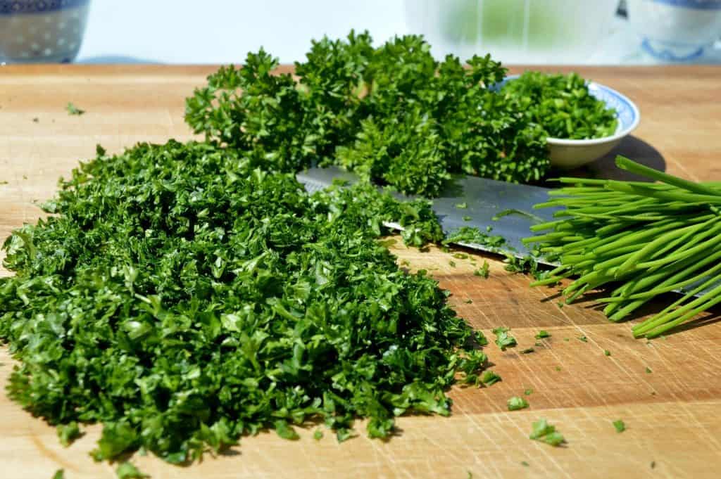 Freshly chopped parsley and knife