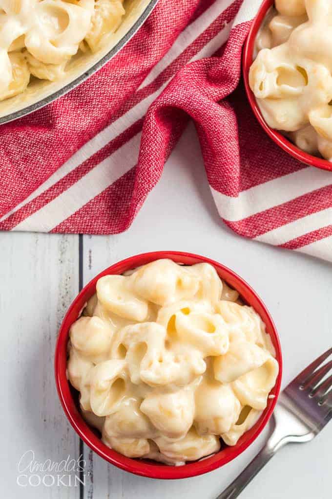 homemade mac and cheese baked in glass bowl