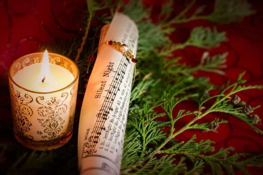 christmas carol and candle