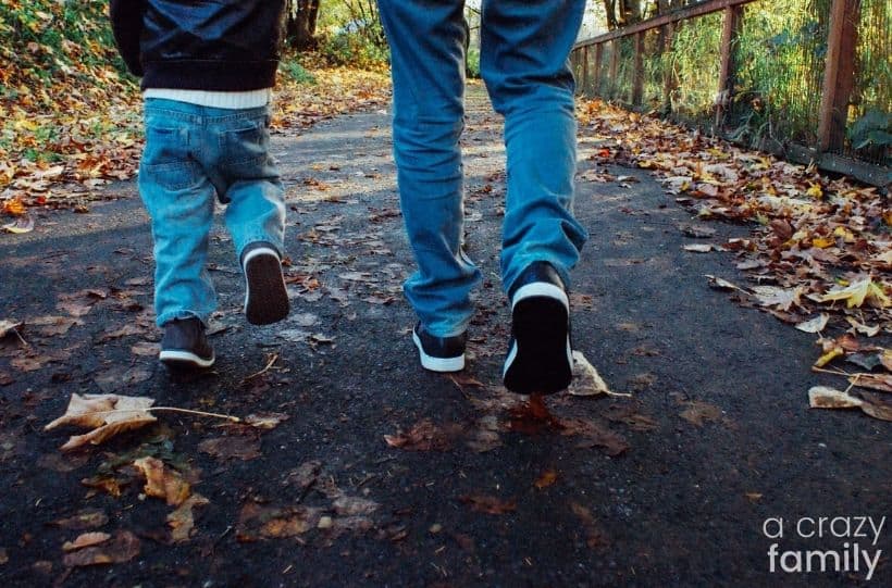 father and son walking