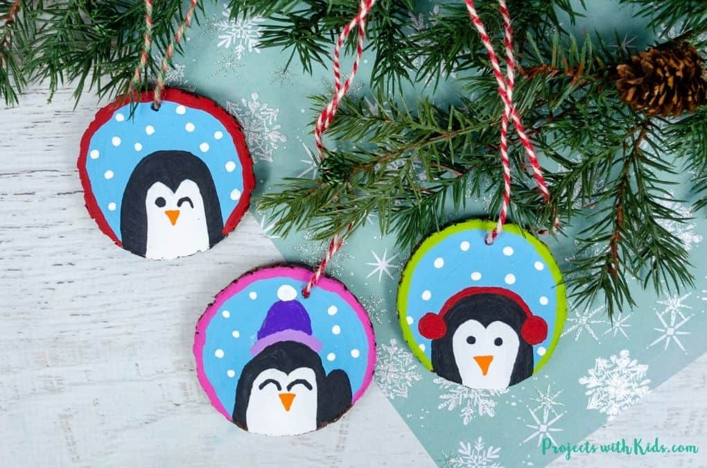 DIY penguin wood slice ornaments