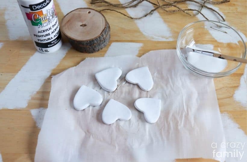 heart shaped clay pieces painted white