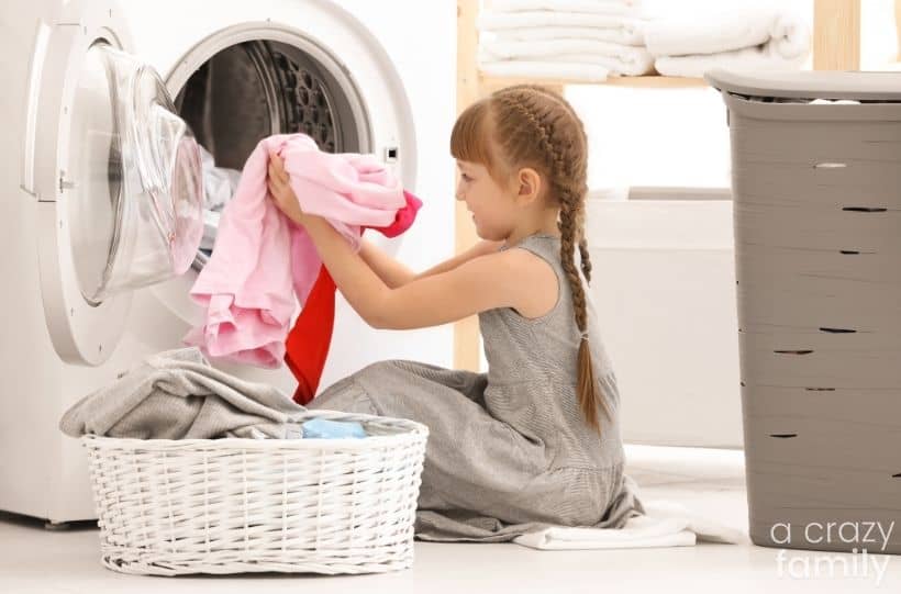 girl doing laundry