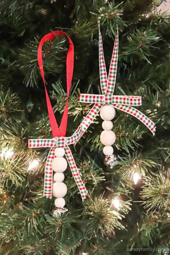 Wooden Bead Jingle Bell Ornament on tree