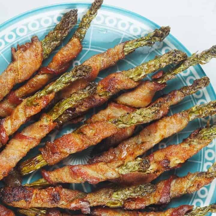 asparagus wrapped in bacon on plate.jpg