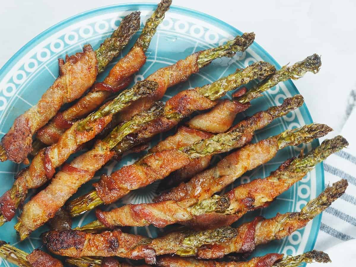 asparagus wrapped in bacon on plate.jpg