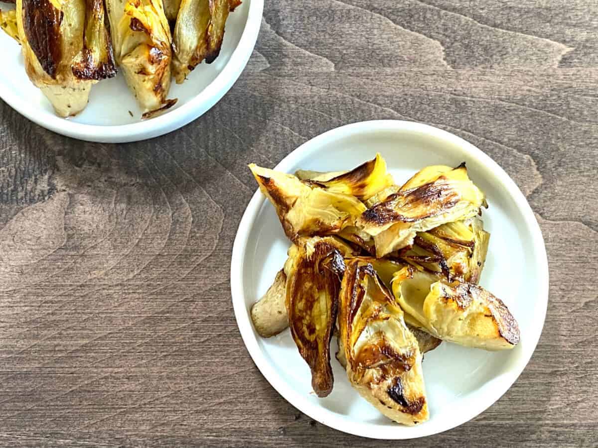 Crispy Baked Marinated Artichoke Hearts featured overhead e1615134518940