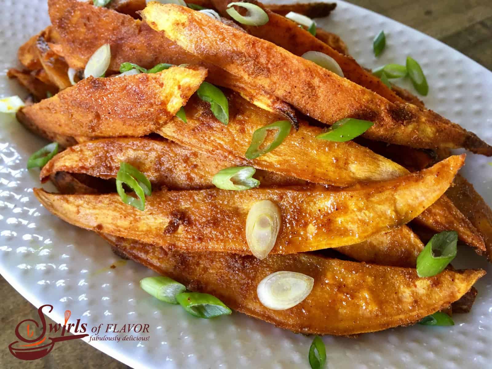 Oven Roasted Tumeric Sweet Potato Fries close upW scaled 1