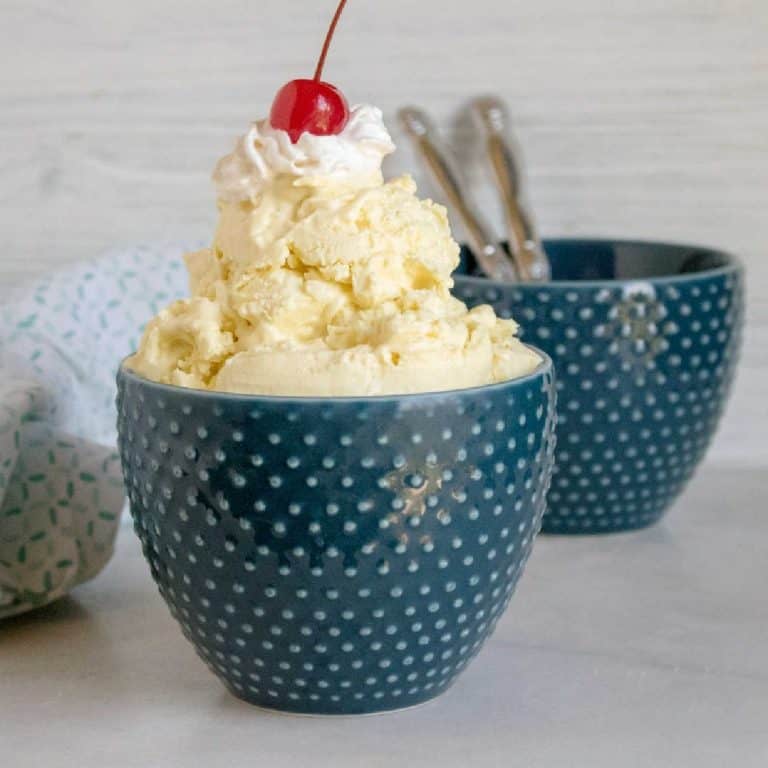 lemon no churn ice cream served in blue bowl