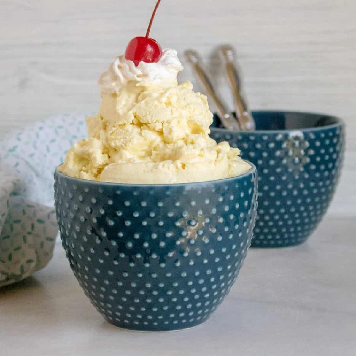 lemon no churn ice cream served in blue bowl
