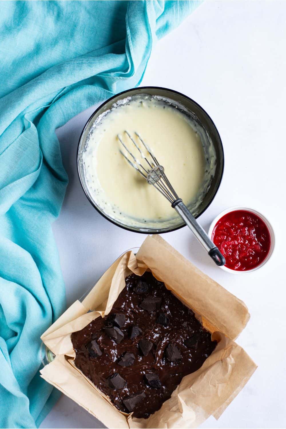 assembling cherry cheesecake brownies
