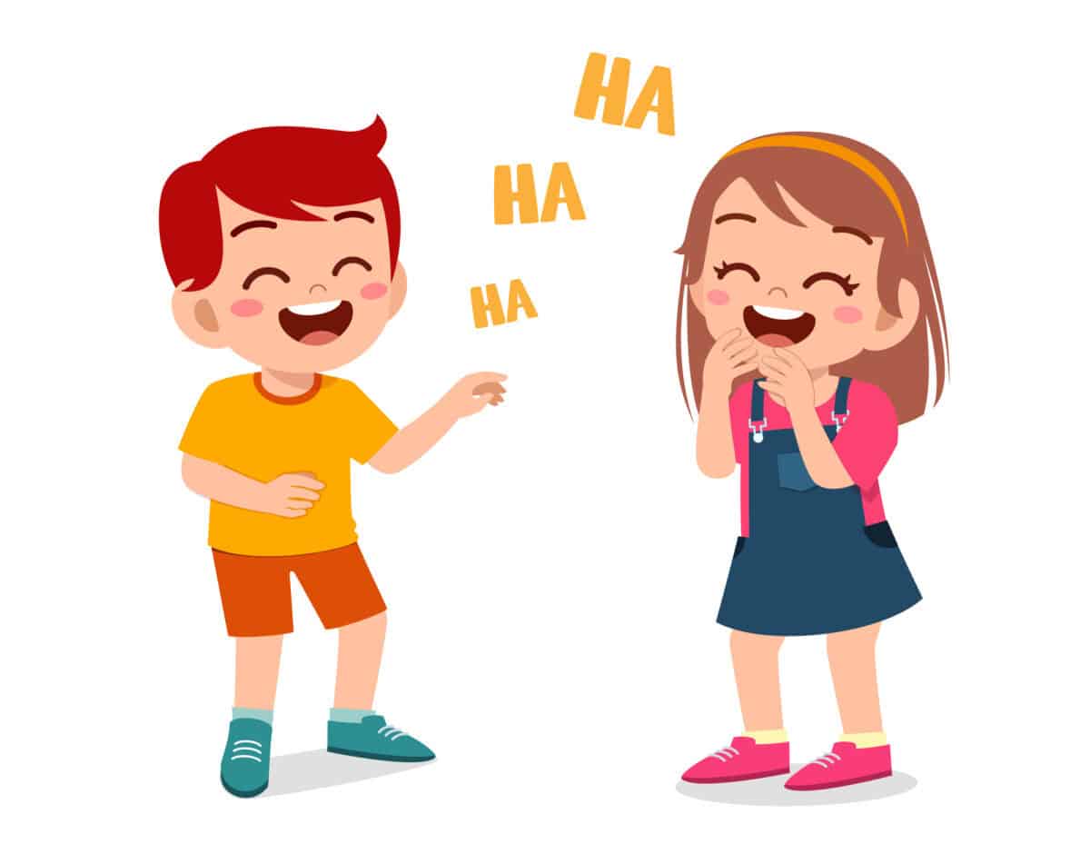 little boy and little girl laugh together