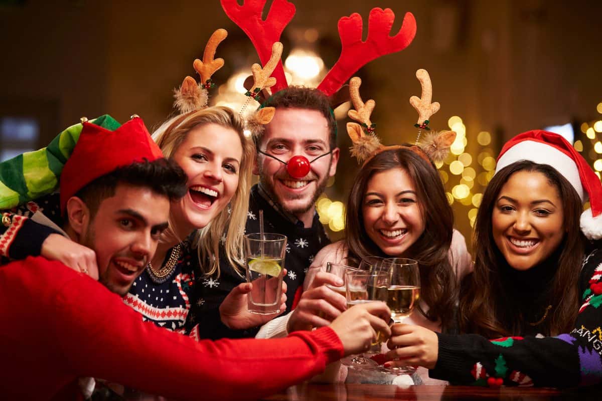 group of friends enjoying christmas Depositphotos_68250129_L